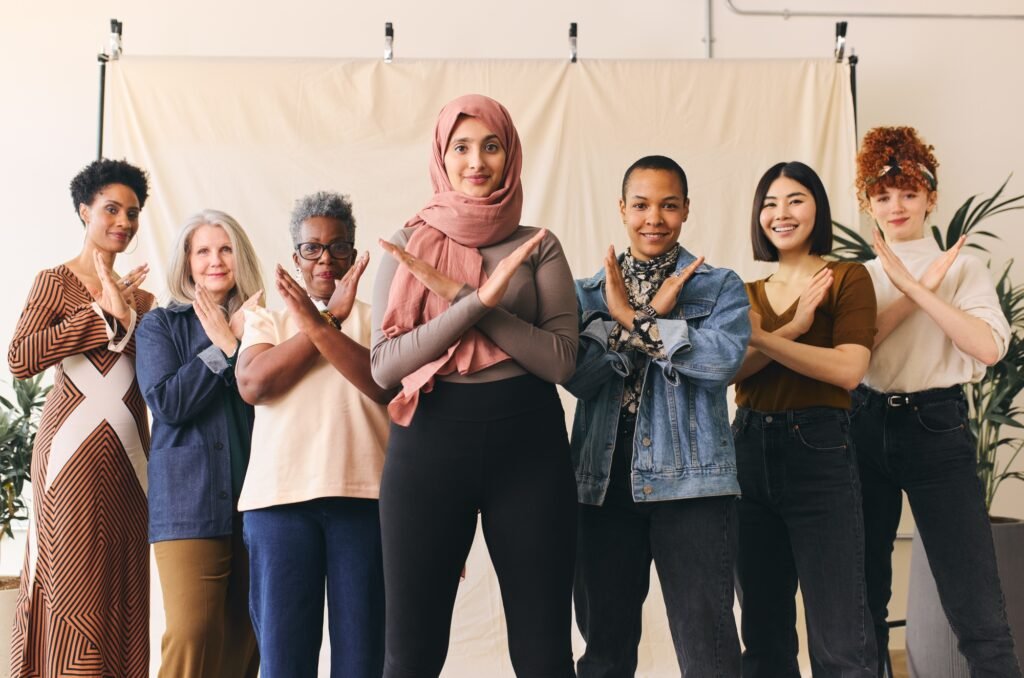 Middle Eastern woman wearing hajib gesturing Break The Bias